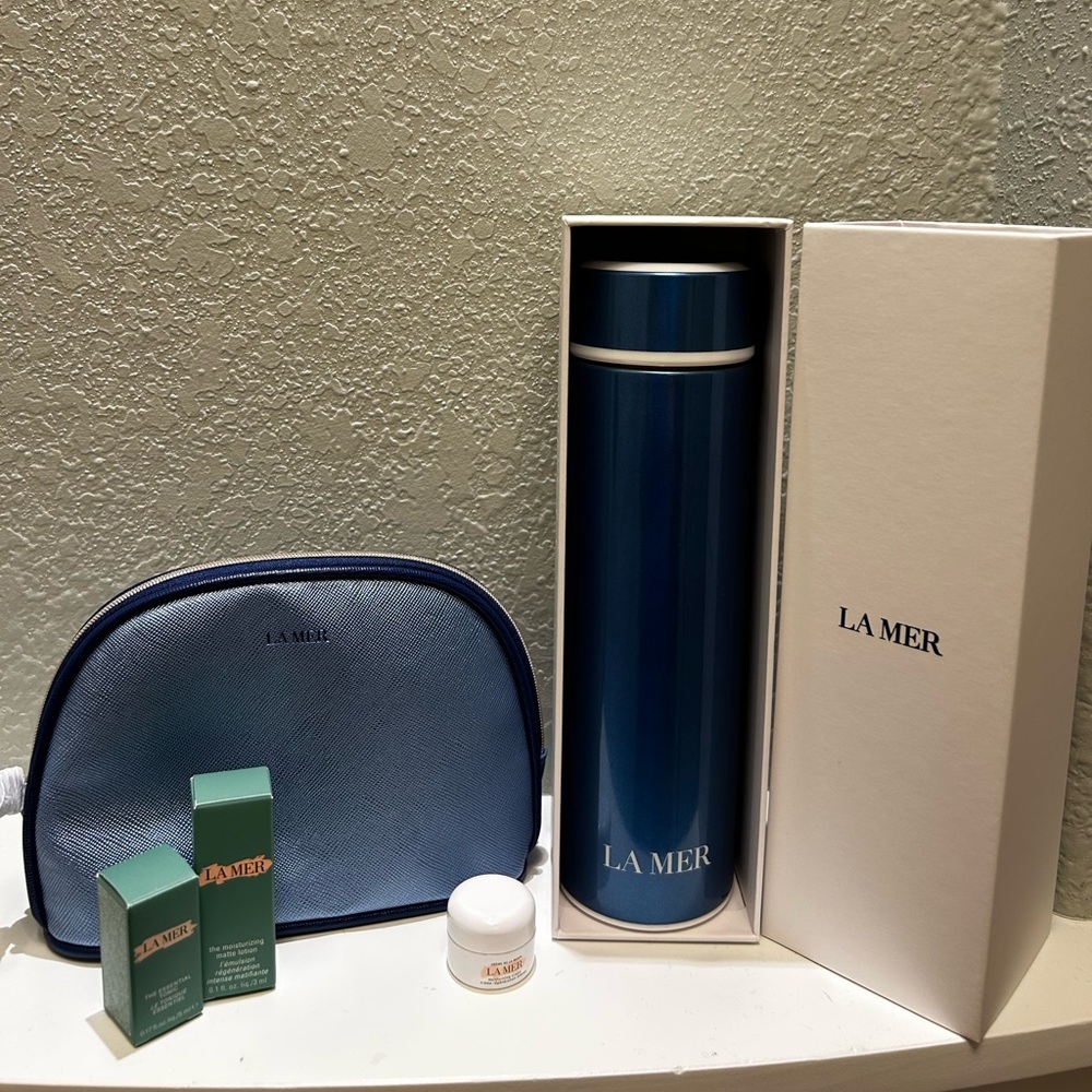 La Mer Blue Thermos or Water-bottle with Matching Pouch and Skincare